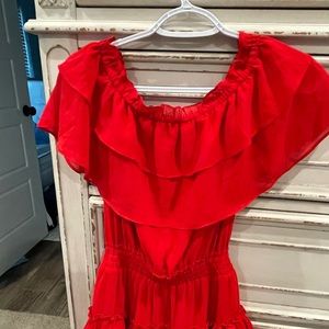 Red boutique purchased dress 100% polyester. Worn once to wedding , like new